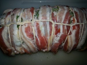 Optional: layer pork with bacon and herbs, then tie off the pork to secure stuffing inside pork pocket.